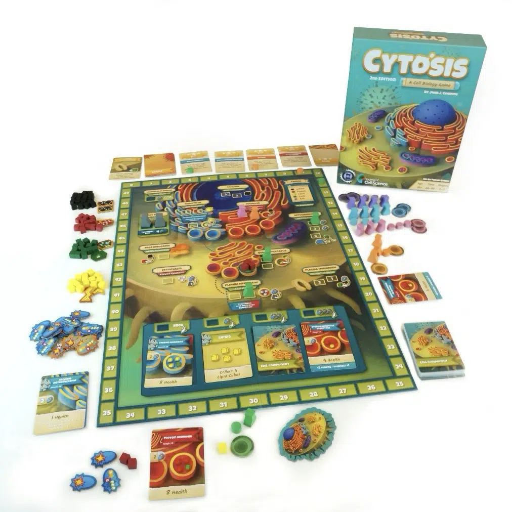 The image shows the Cytosis board game set up, including the game board, box, cards, tokens, resource pieces, and game pieces arranged neatly on a white background.